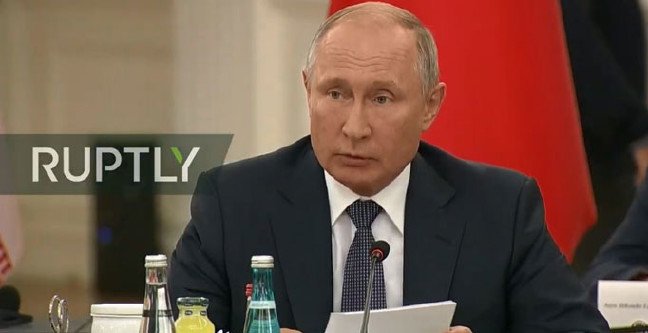 üçlü zirve putin 9addd